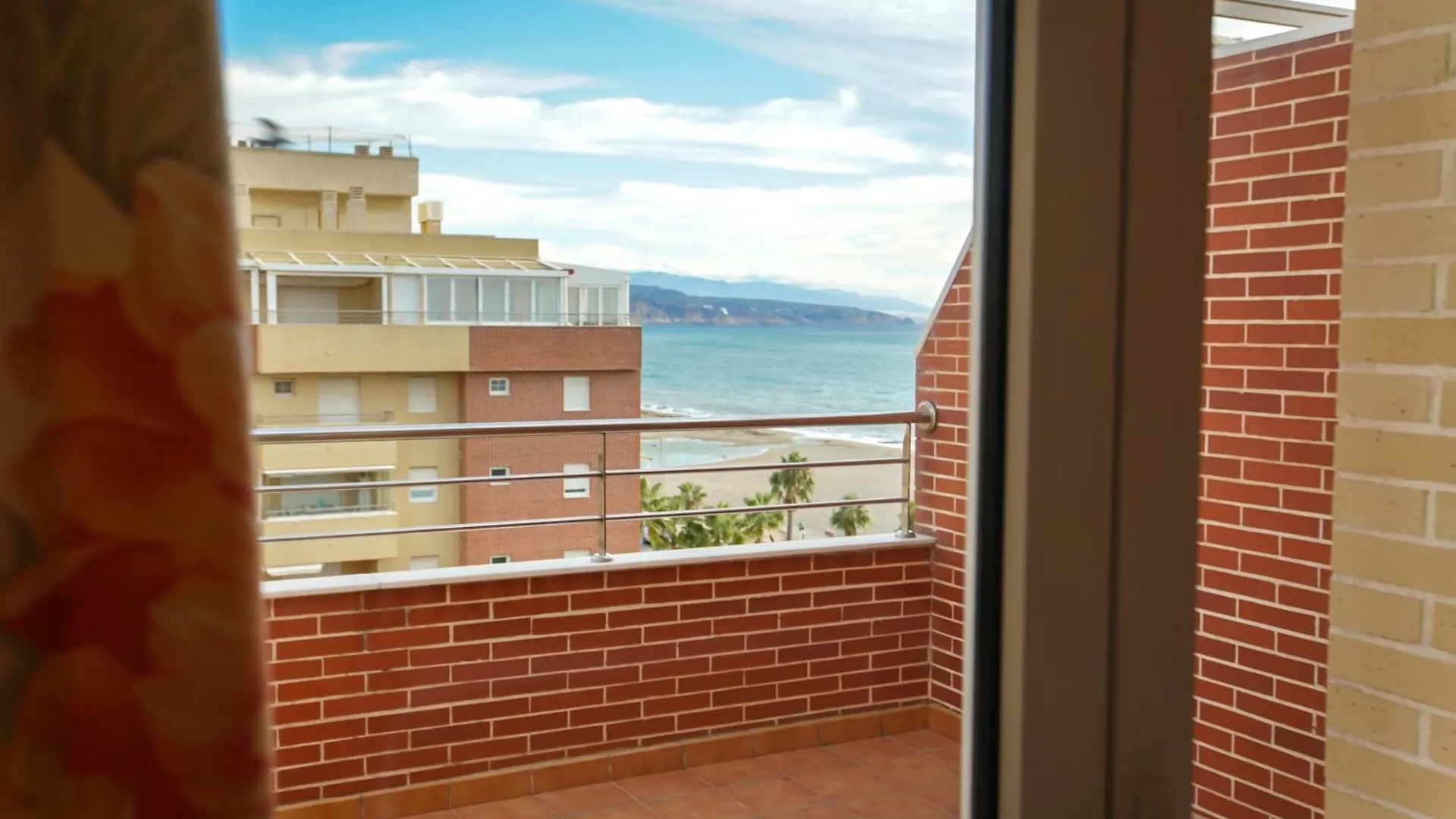 Seaside Terrace Apartments: Beachfront Living with Pool and Views Roquetas de Mar